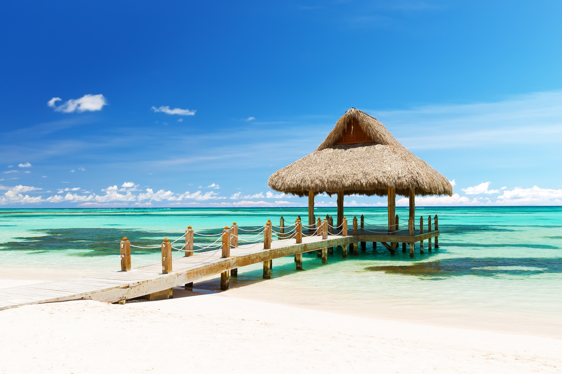 Beautiful gazebo on the tropical white sandy beach in Punta Cana, Dominican Republic