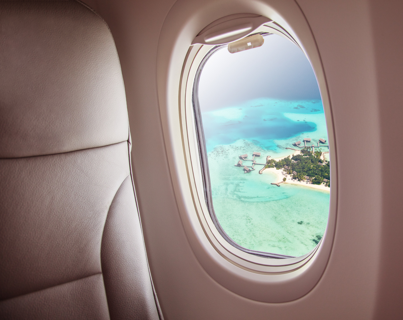 Airplane Window with Island View